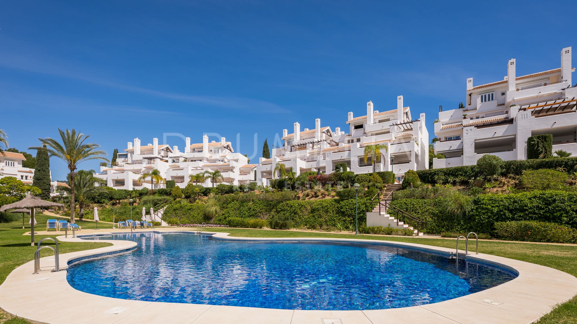 Elegant, modern beachfront apartment with sea views in exclusive Palm Beach, Marbella East.